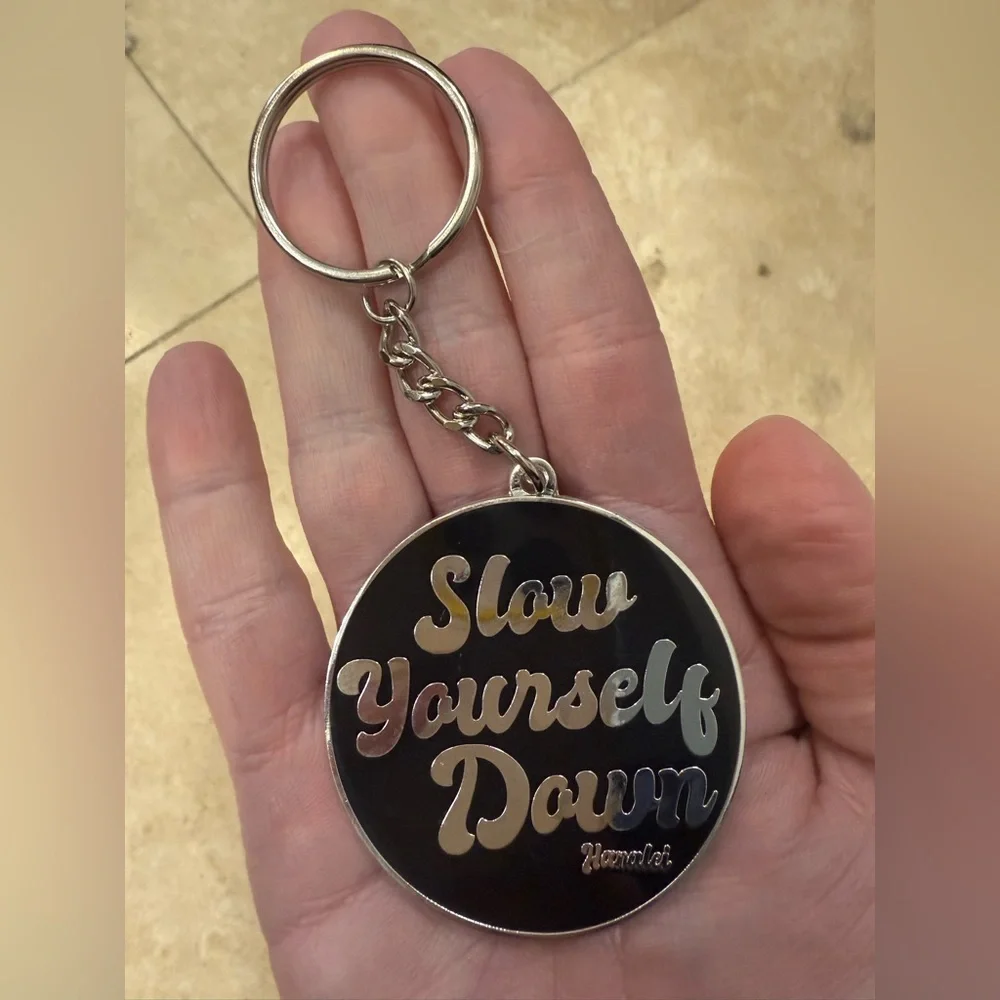 NWT Silver and Black Slow Yourself Down Keychain from Hanalei in Kauai